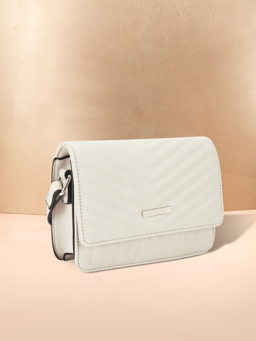 

Forever Glam by Pantaloons Off White Quilted Sling Bag