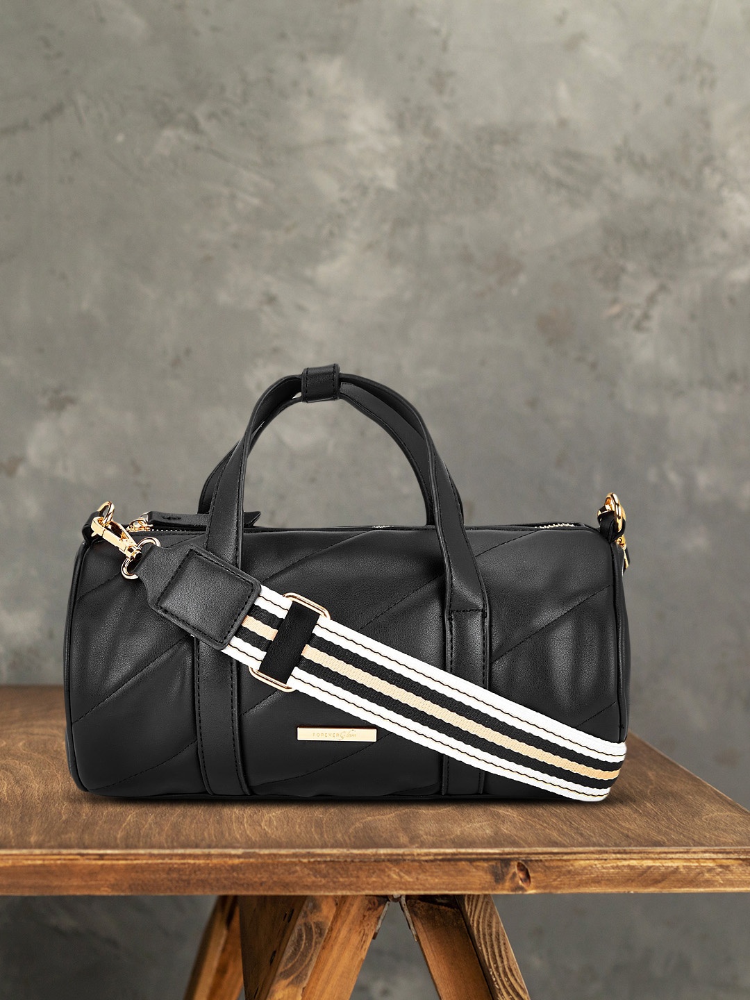 

Forever Glam by Pantaloons Black Handheld Bowling Bag with Contrast Sling
