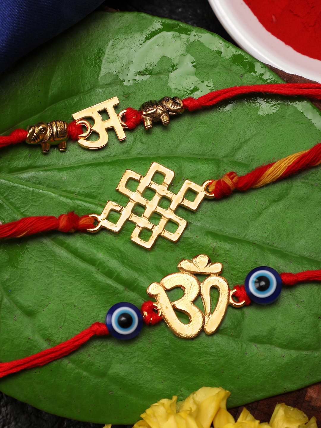 

Yellow Chimes Set of 3 Gold & Red Handmade Om Rakhi with Roli Chawal & Card