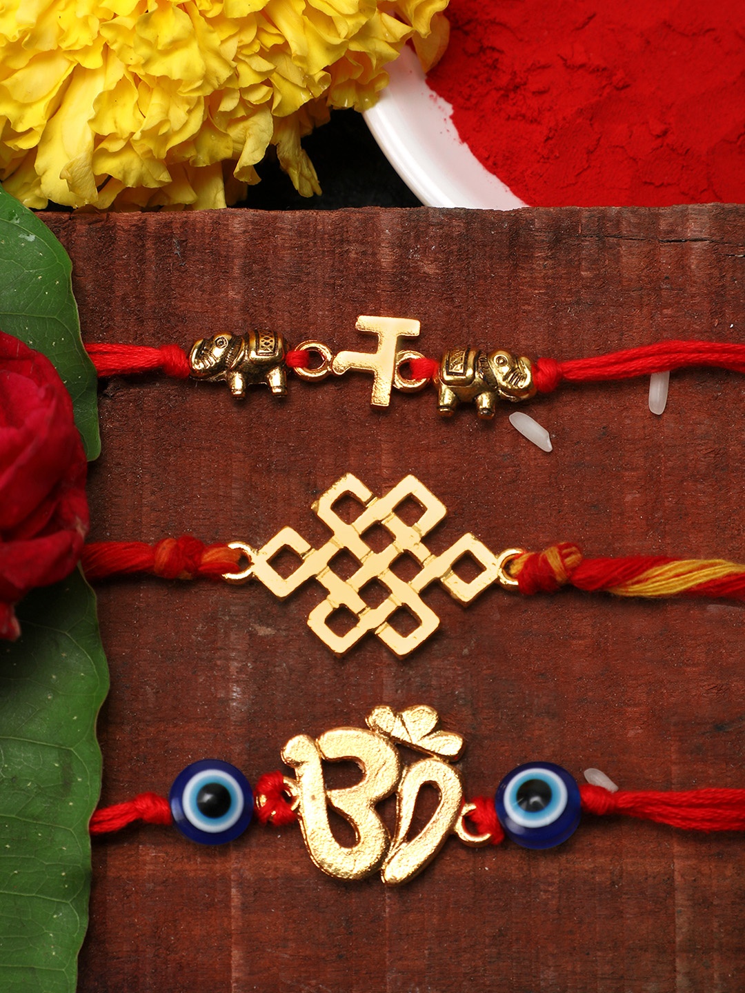 

Yellow Chimes Combo of 3 Rakhi with Roli Chawal & Card, Gold