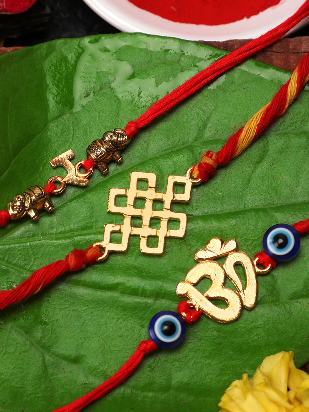 

Yellow Chimes Set of 3 Gold & Red Handmade Om Rakhi with Roli Chawal & Card