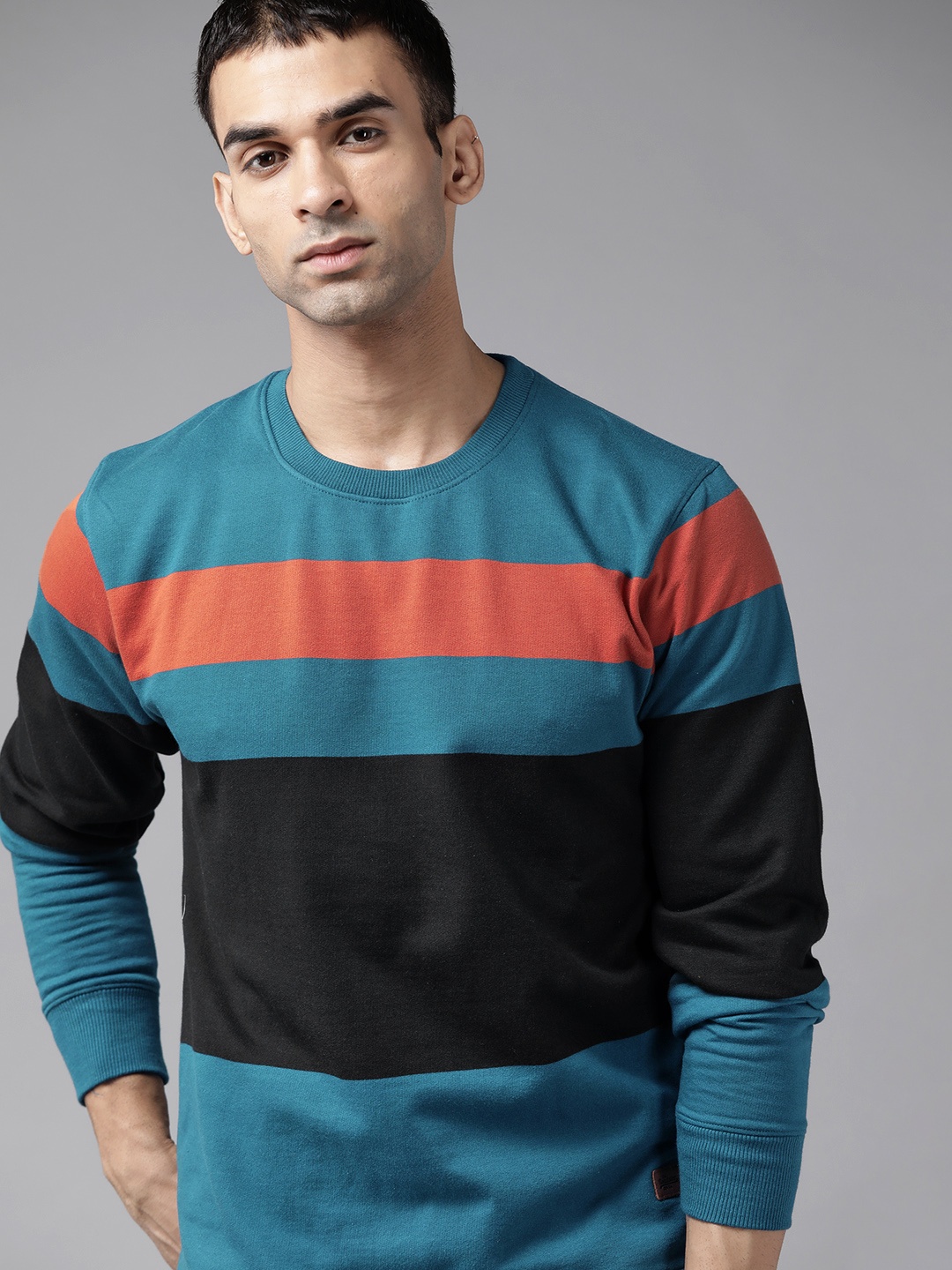 

Roadster Men Teal B;ue & Black Striped Sweatshirt