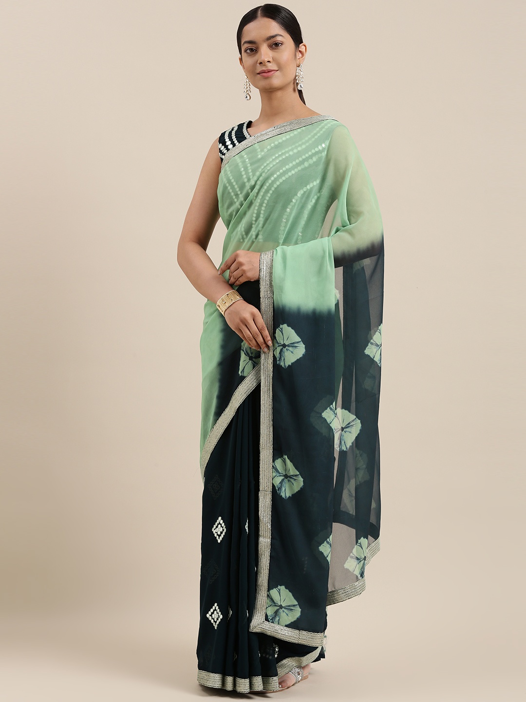 

RedRound Green Sequinned Half and Half Saree