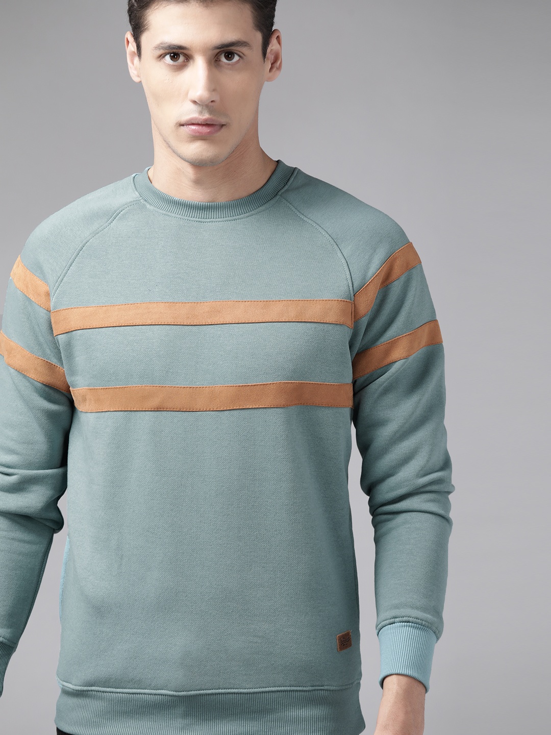 

Roadster Men Blue & Brown Striped Detail Sweatshirt