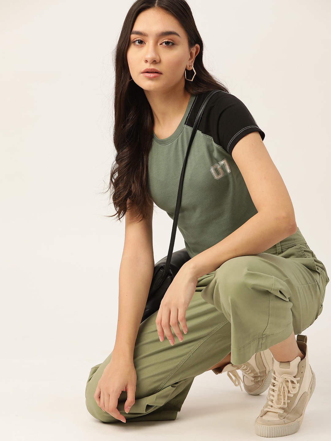 

DressBerry Women Olive Green & Black Solid Sustainable & Recycled T-shirt