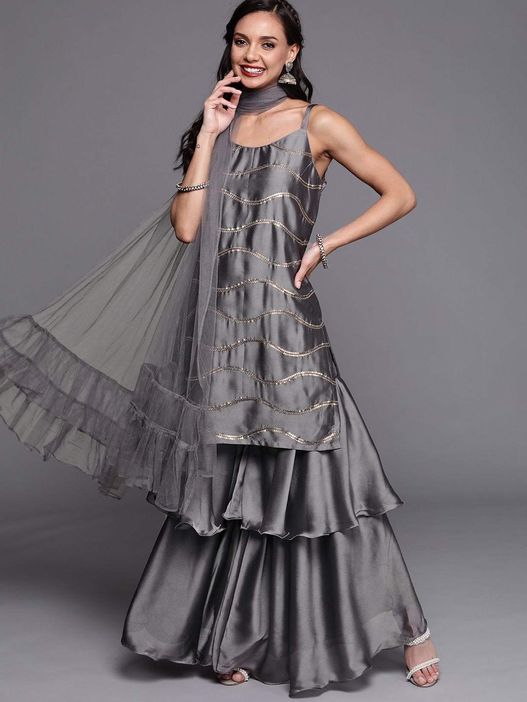 

Inddus Women Grey & Golden Embellished Sequinned Kurta with Sharara & Dupatta