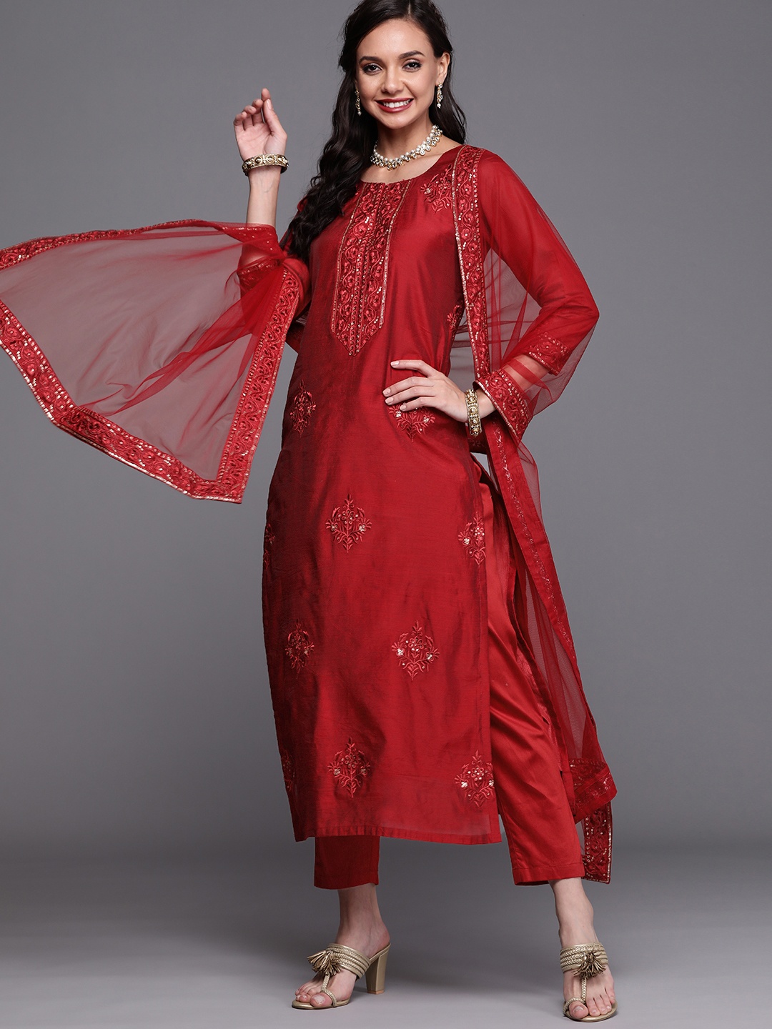 

Women Red Ethnic Motifs Sequinned Kurta with Trousers & With Dupatta