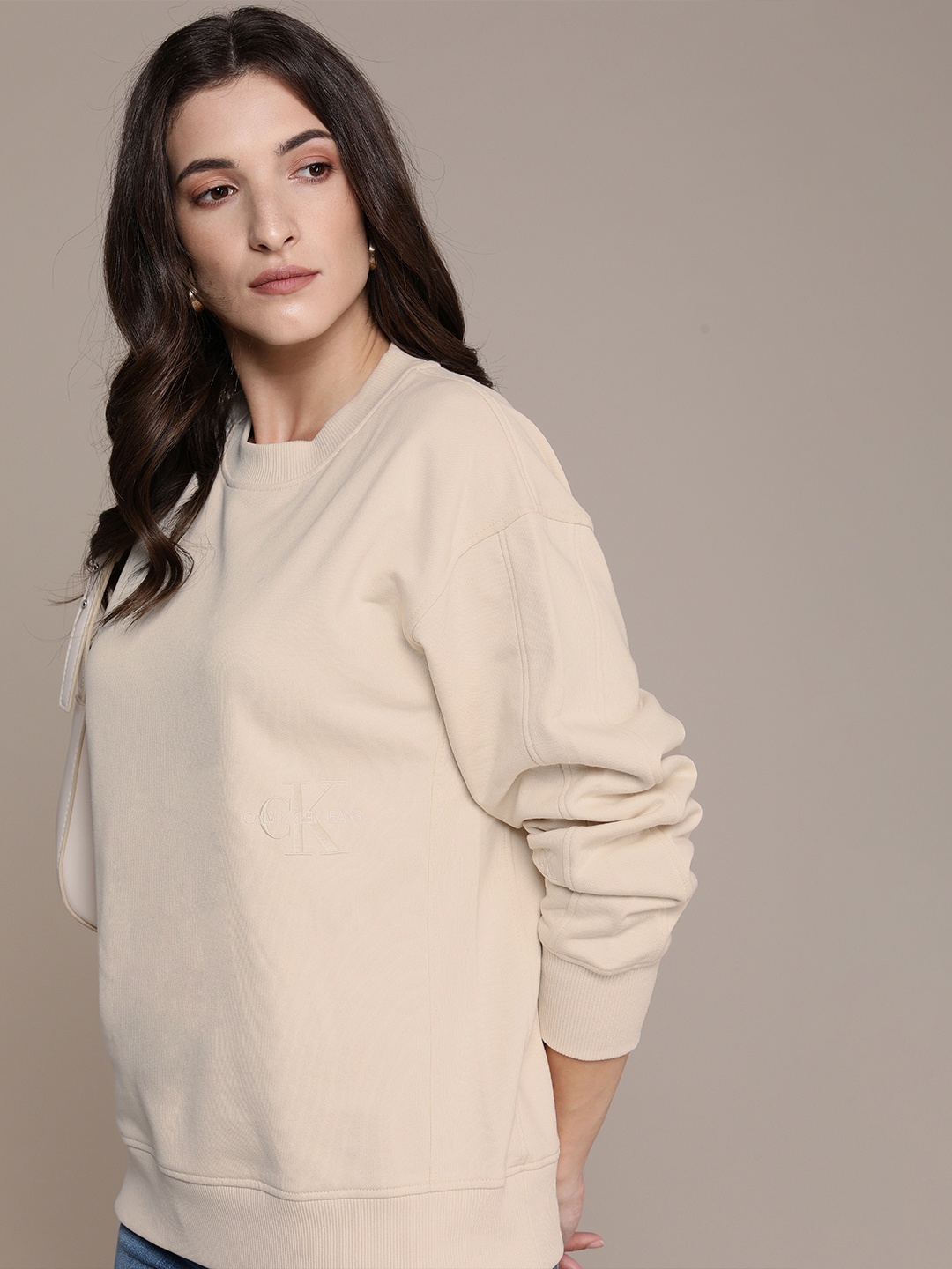 

Calvin Klein Jeans Women Beige AF-OFF PLACED MONOGRAM Brand Logo Embroidered Sweatshirt