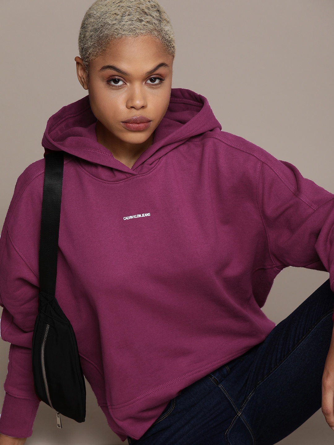 

Calvin Klein Jeans Women Purple Hooded Sweatshirt with Brand Logo Print