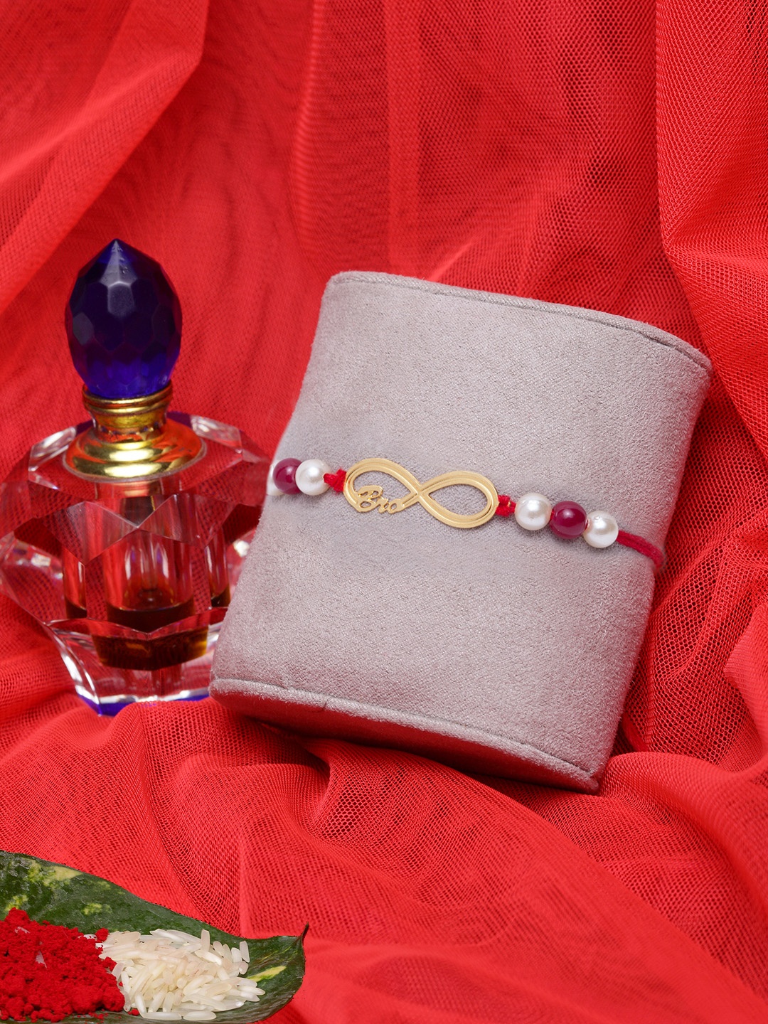 

PANASH Men Gold-Toned & Red Brass Handcrafted Rakhi