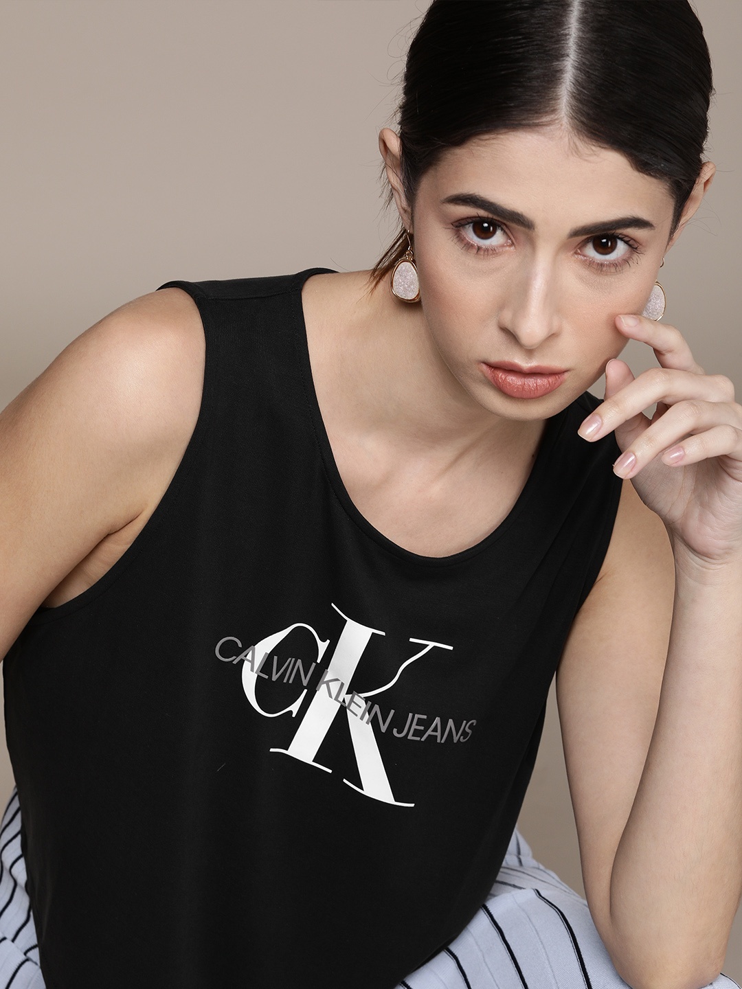 

Calvin Klein Jeans Women Black & White Brand Logo Printed Slim Fit MONOGRAM MODAL T-shirt