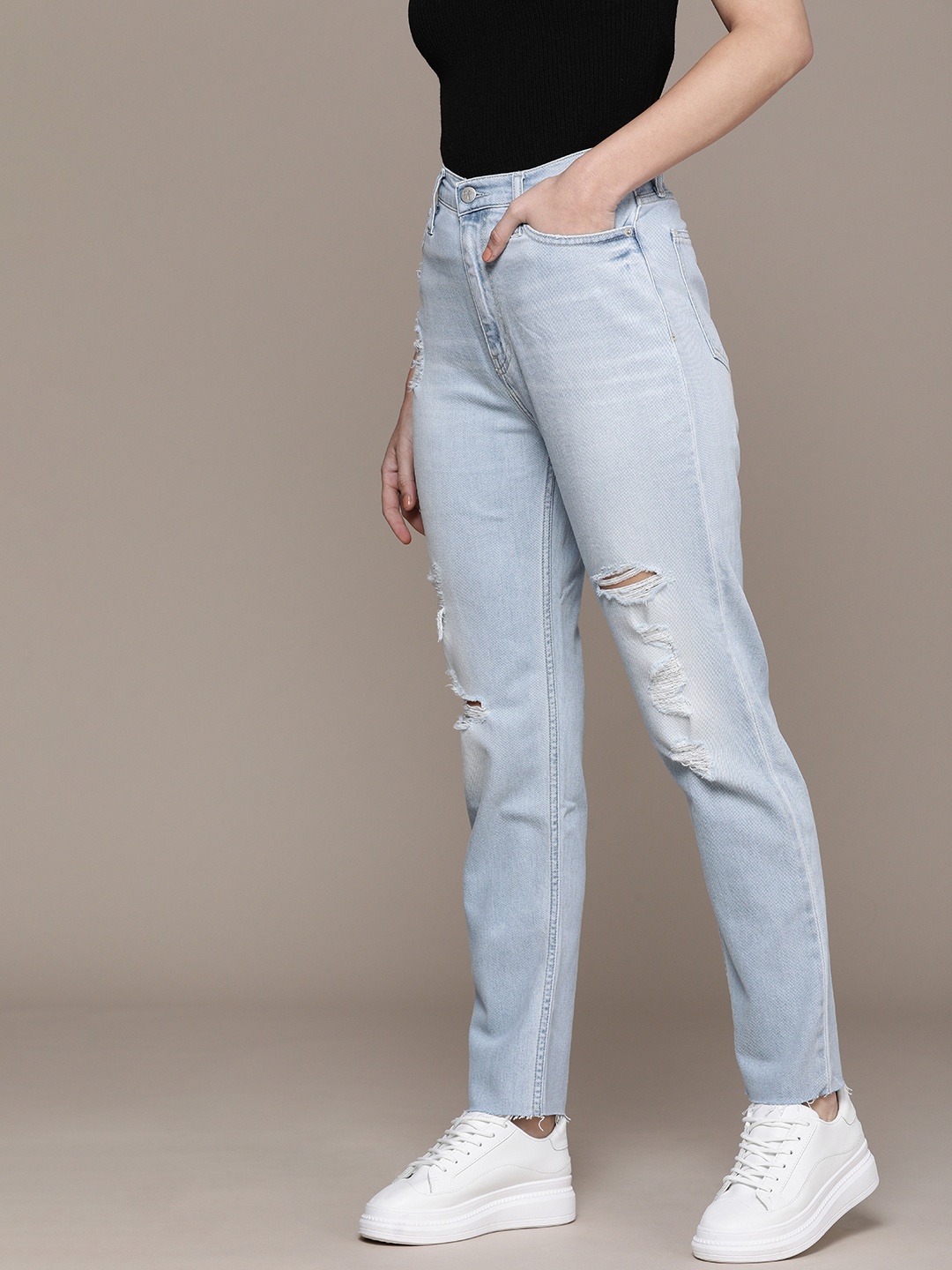 

Calvin Klein Jeans Women Blue Tapered Fit High-Rise Highly Distressed Light Fade Stretchable Jeans