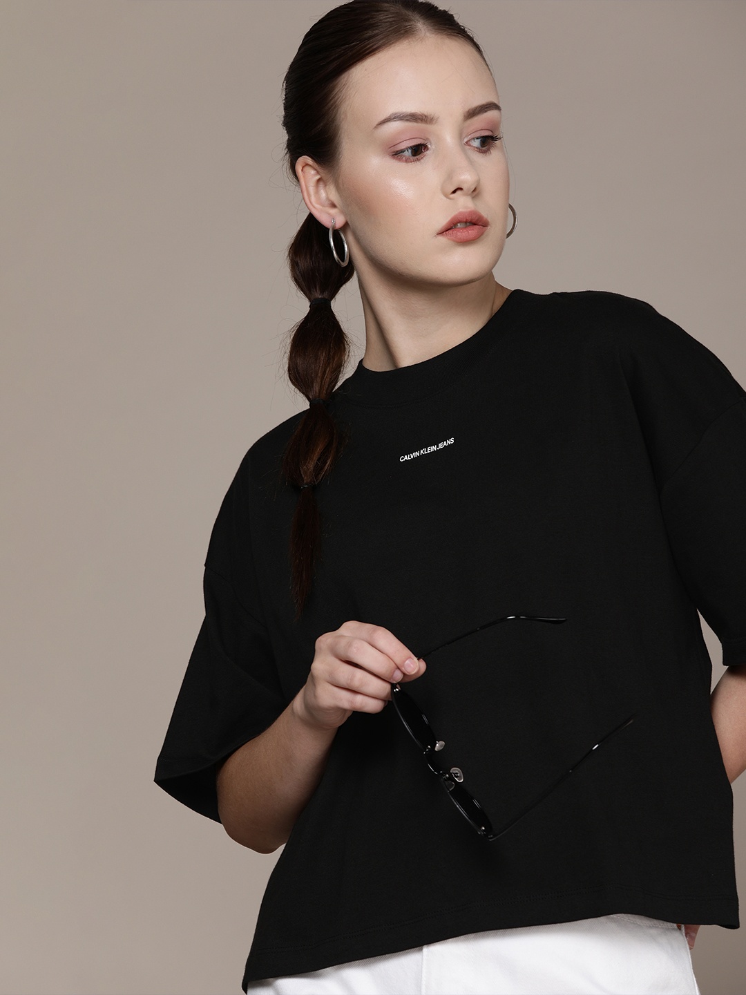 

Calvin Klein Jeans Women Black Typography Drop-Shoulder Sleeves Boxy T-shirt