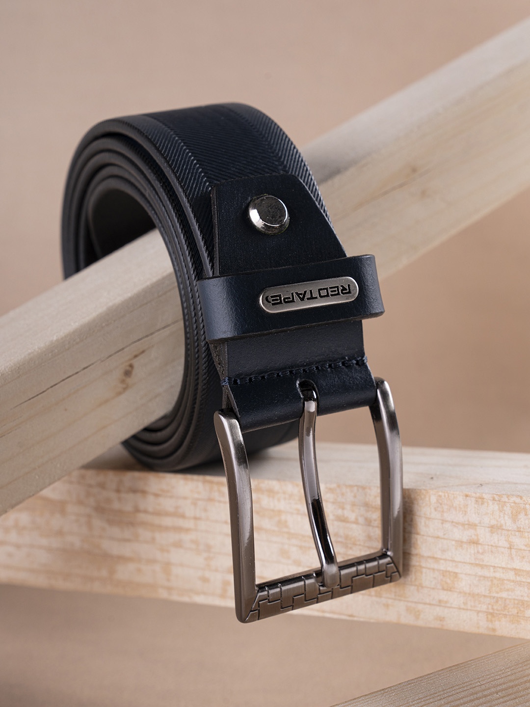 

Red Tape Men Navy Blue Textured Leather Belt