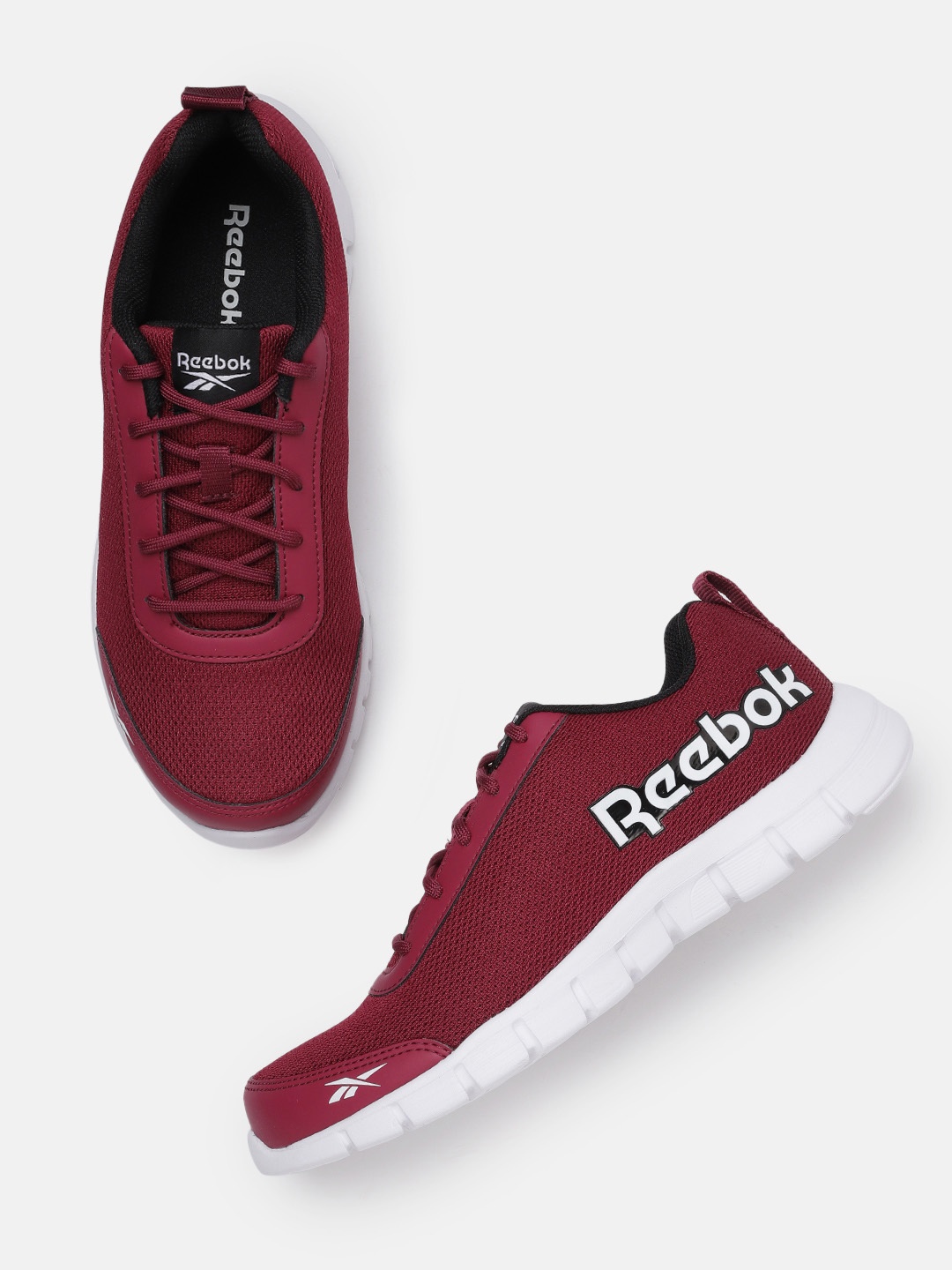 

Reebok Women Maroon Woven Design Inspire Running Shoes