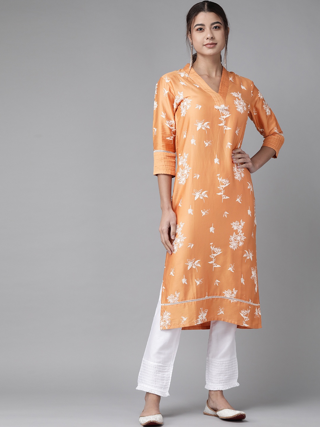 

Indo Era Women Peach-Coloured Floral Printed Regular Kurta with Trousers