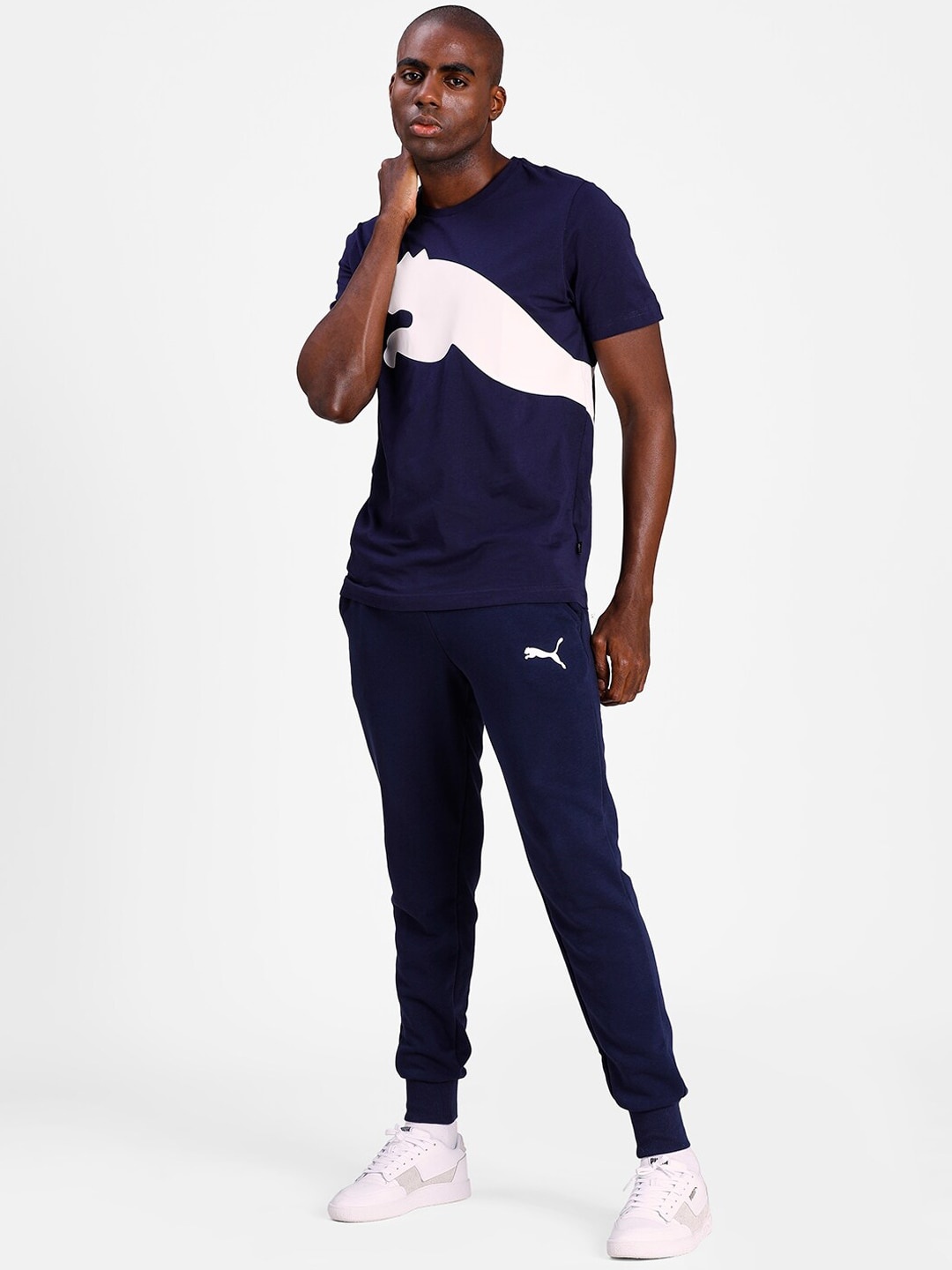 Puma Men Navy Blue Solid Sustainable ESS Logo Pants - buy at the price ...