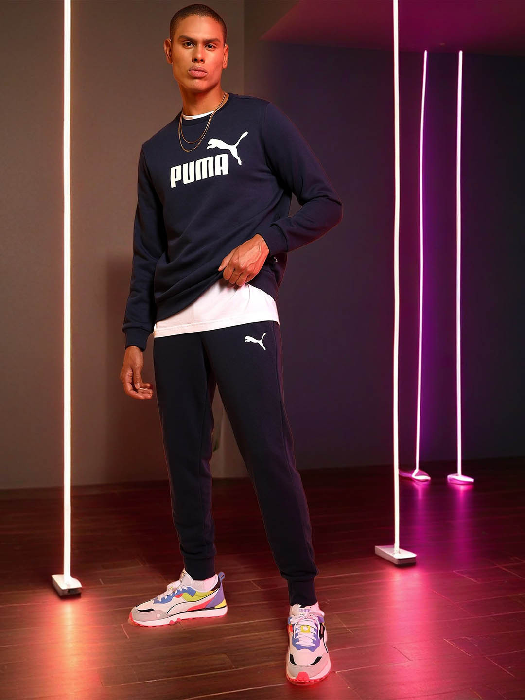 

Puma Men Navy Blue Solid Sustainable ESS Logo Pants