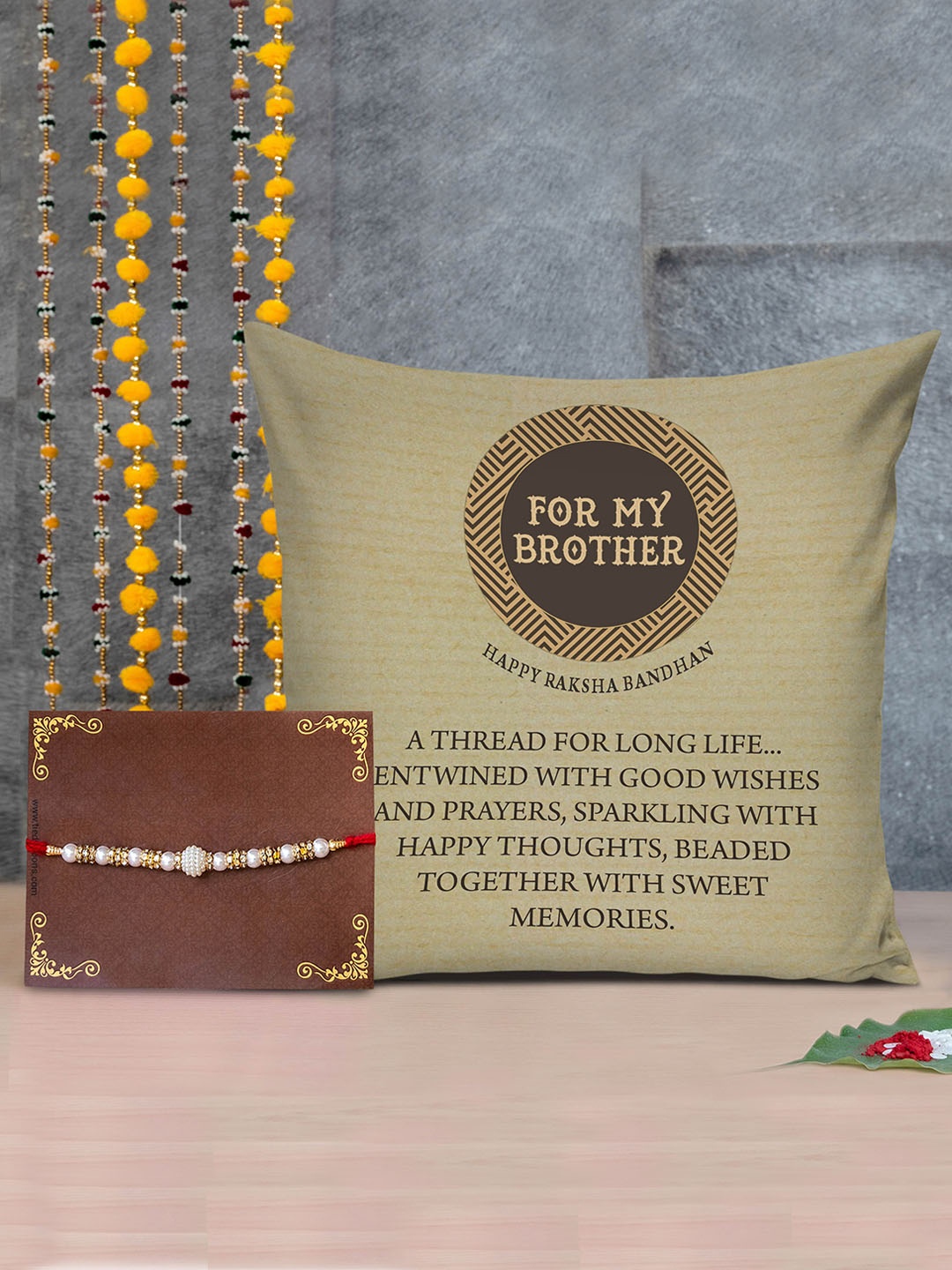 

TIED RIBBONS Set Of 2 Printed Cushion & Rakhi Gift set, Red