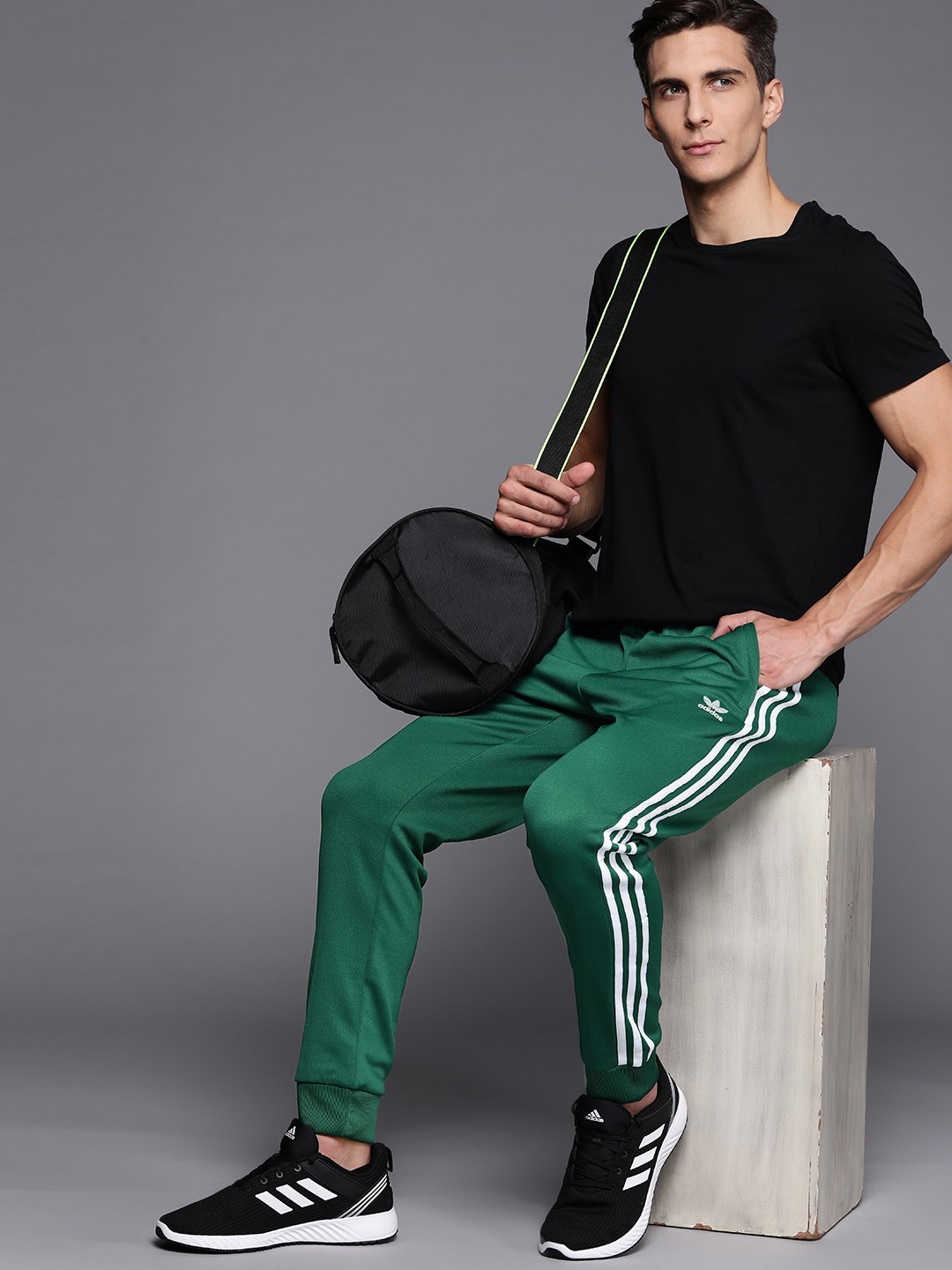 

ADIDAS Originals Men Green Solid Slim Fit Adicolor Classics PrimeBlue SST Sustainable Joggers