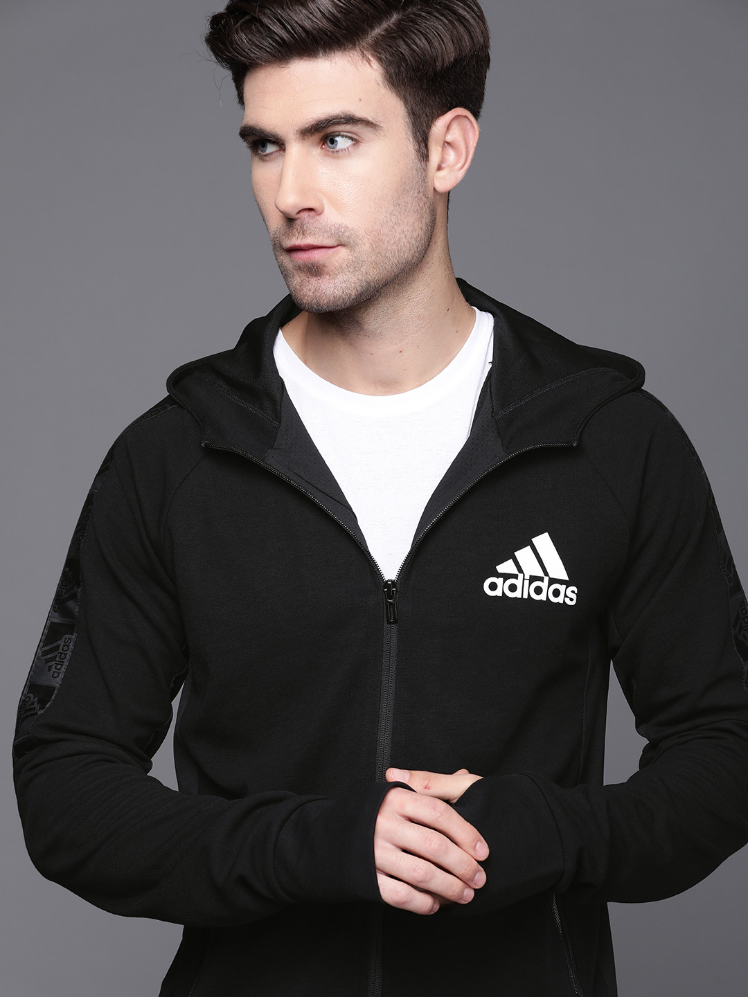 

ADIDAS Men Black Hooded Solid Sweatshirt