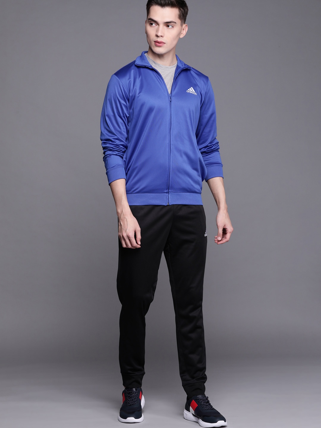 

ADIDAS Men Blue & Black Solid Track Suit