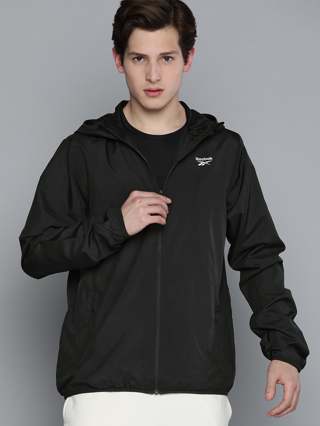 

Reebok Men Black Solid Training Sporty Jacket