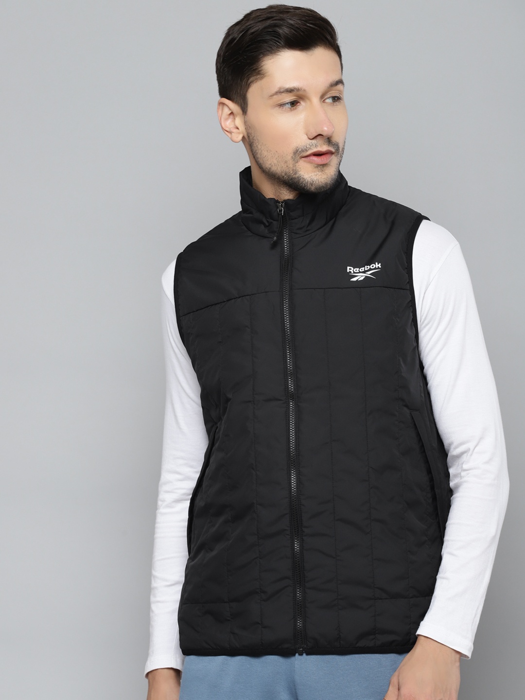 

Reebok Men Black OW LT PAD VST Solid Outdoor Jacket