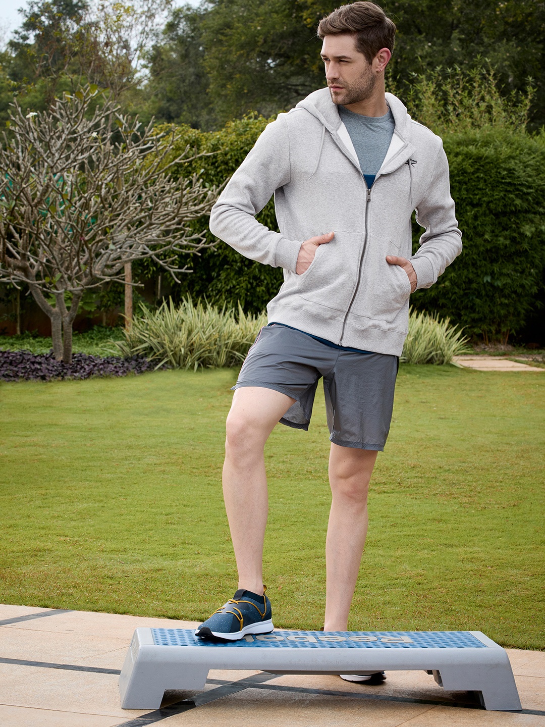 

Reebok Men Grey Melange Solid Sporty Jacket