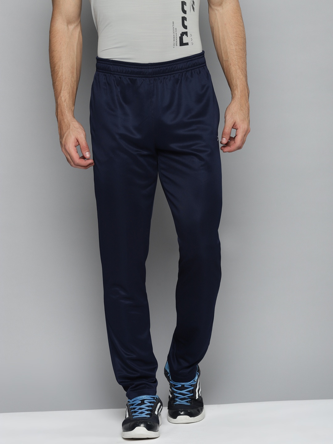 

Reebok Men Navy Blue Solid Foundation Base Training Track Pants