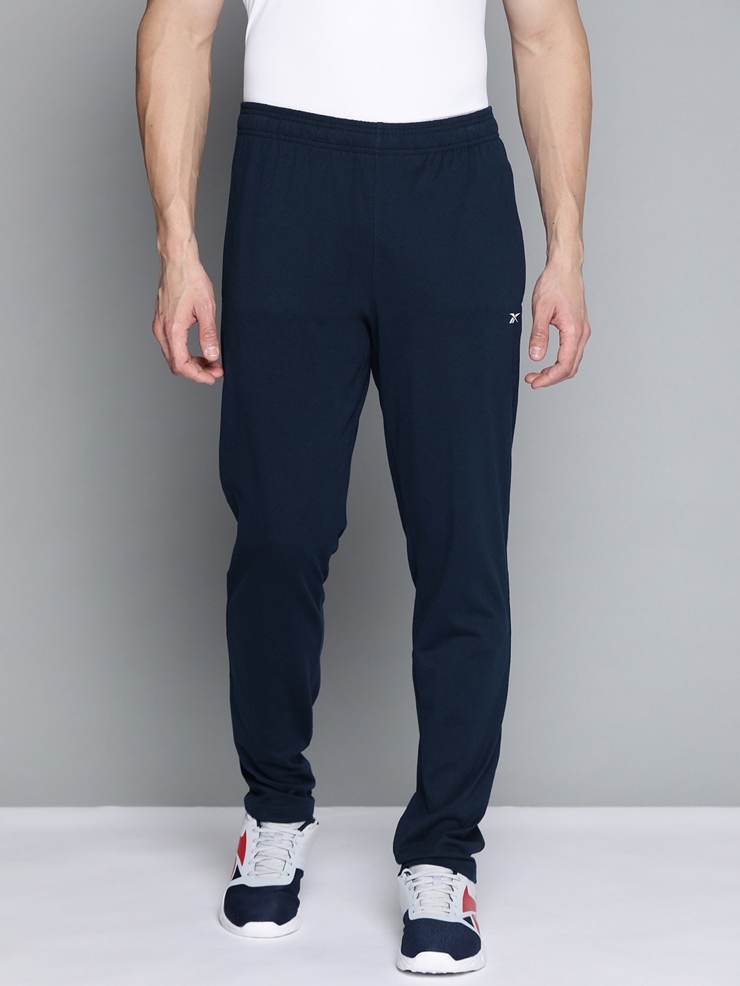 

Reebok Men Navy Blue Pure Cotton TE Vec Training Solid Track Pants