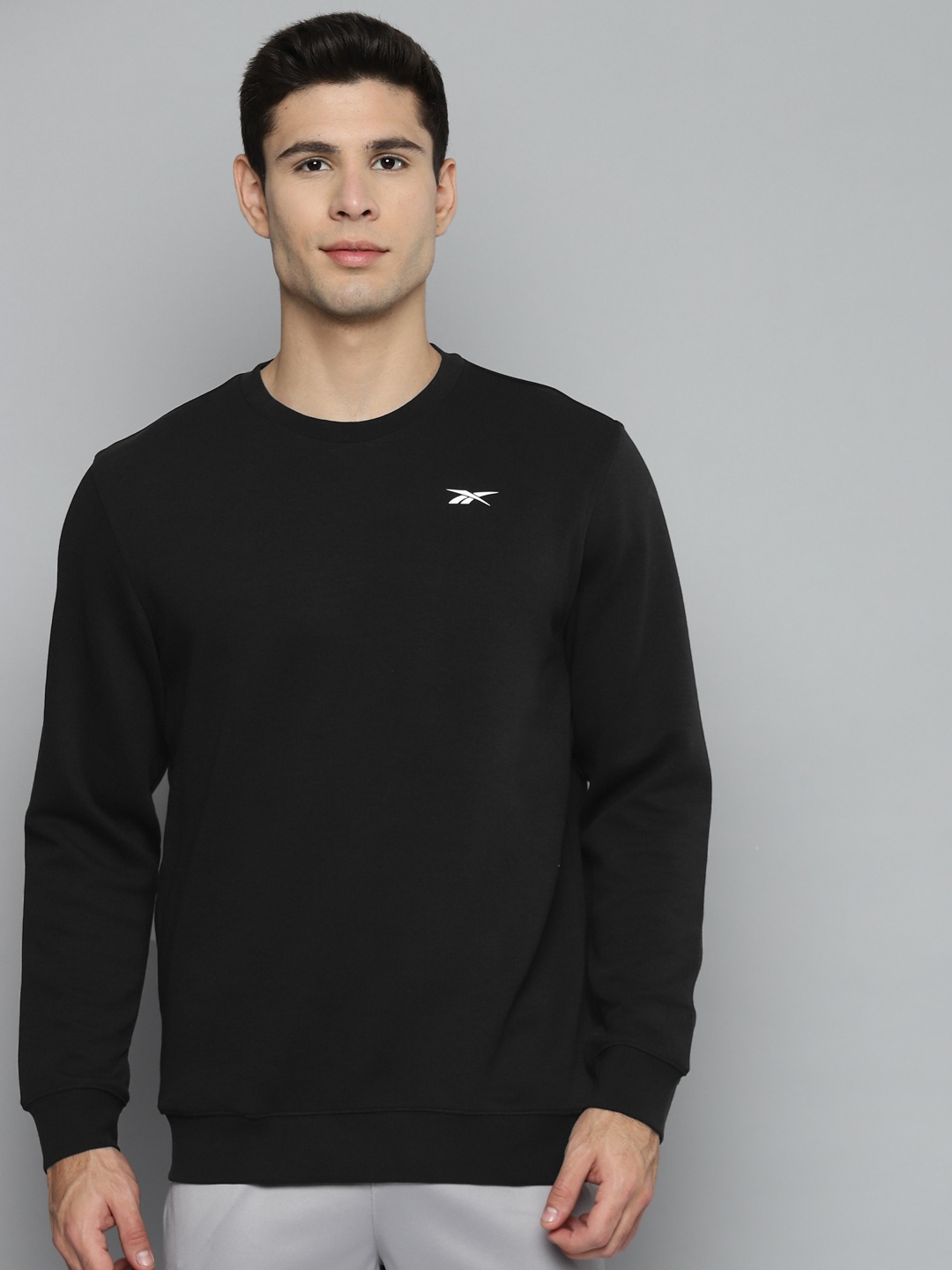 

Reebok Men Black Sweatshirt
