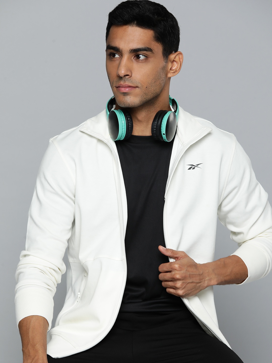

Reebok Core Track Top Zippered Pockets Training Sweatshirt, Off white