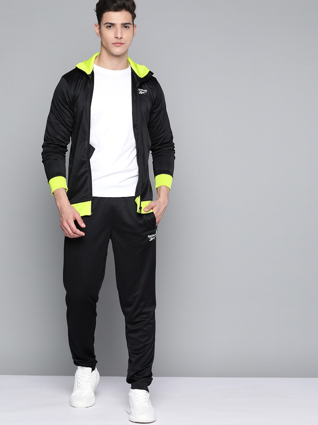 

Reebok Men Black Core BAS Solid Tracksuit