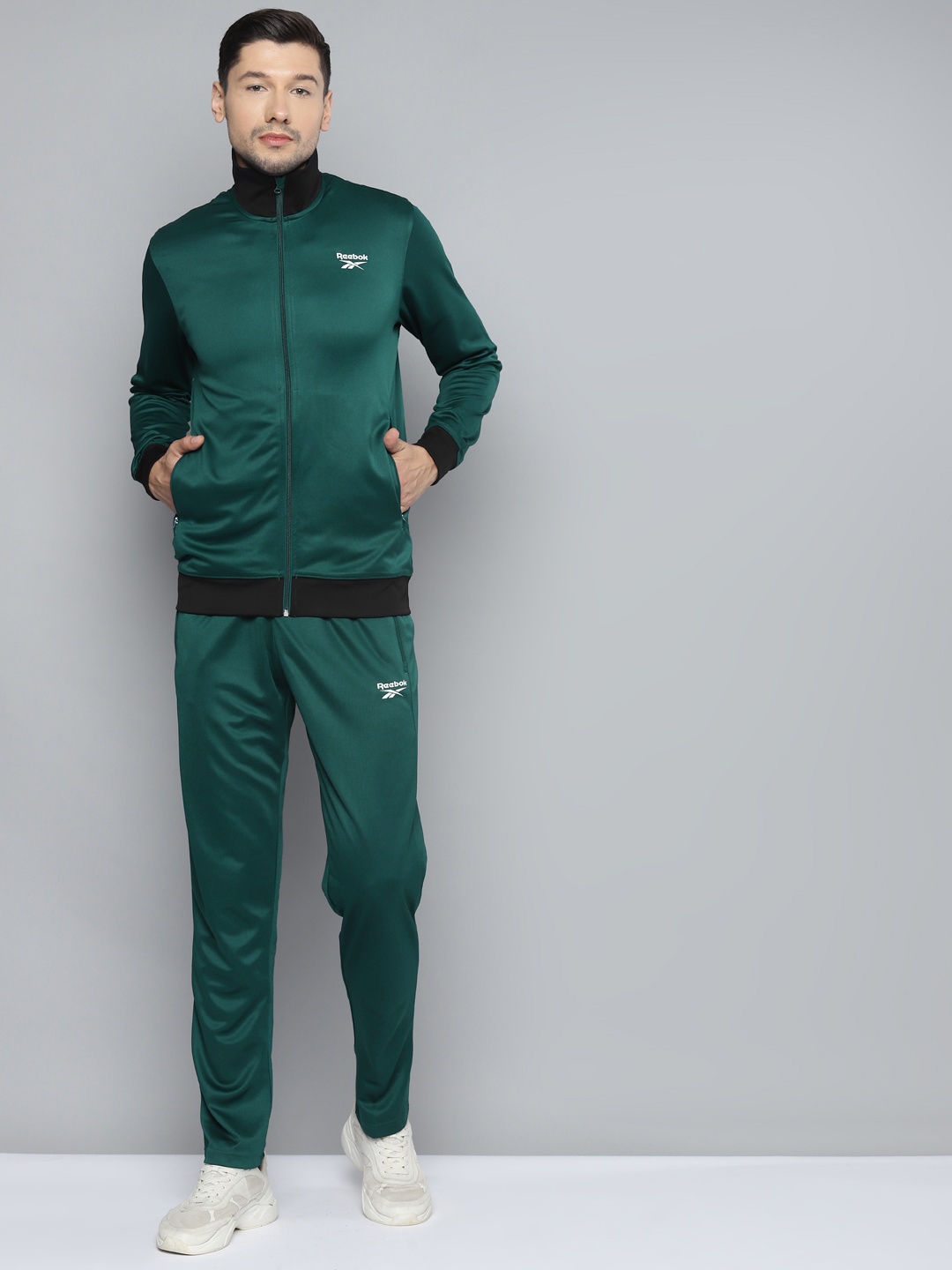 

Reebok Men Green Solid Core BAS Training Tracksuit