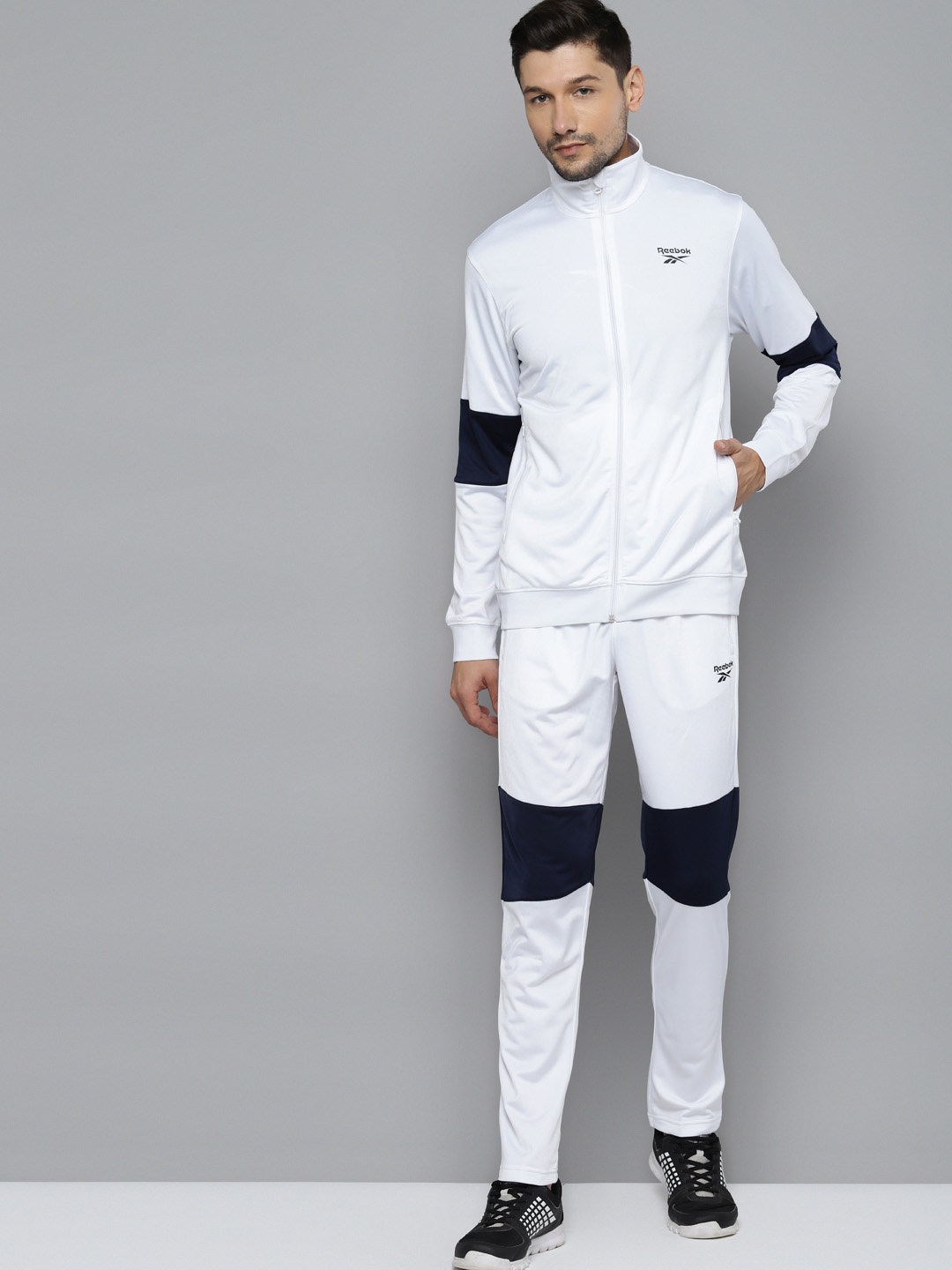 

Reebok Men White Solid CORE TRACKSUIT