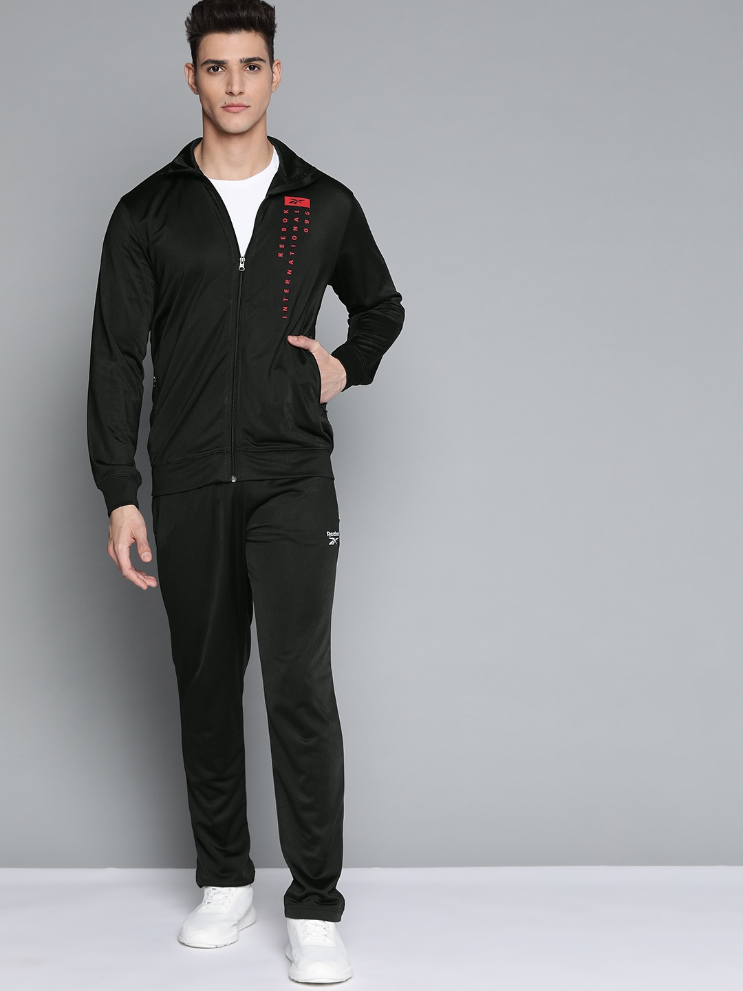 

Reebok Men Black Workout ENH Solid Training Tracksuit