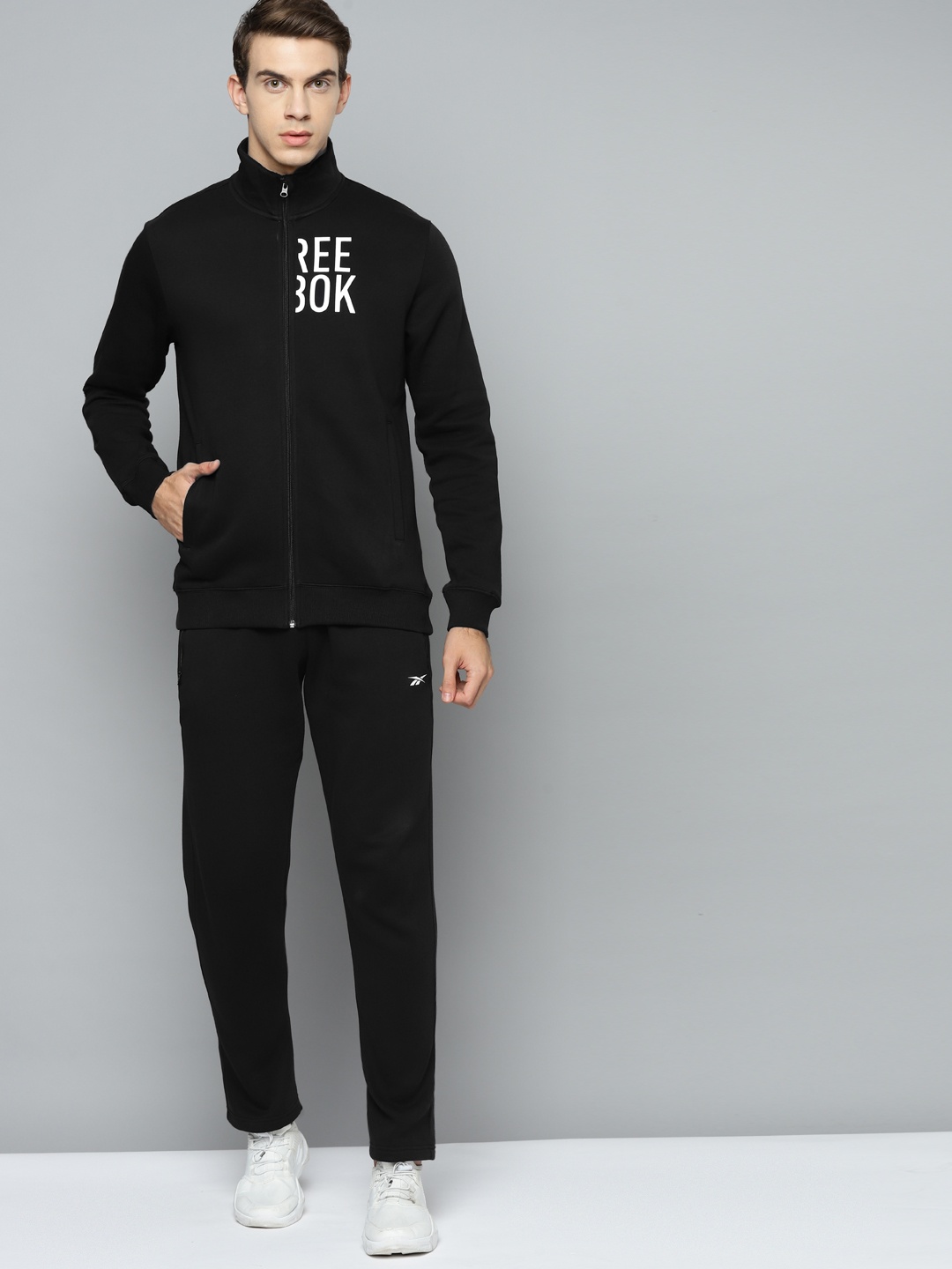 

Reebok Men Black Solid Training Vector Tracksuit