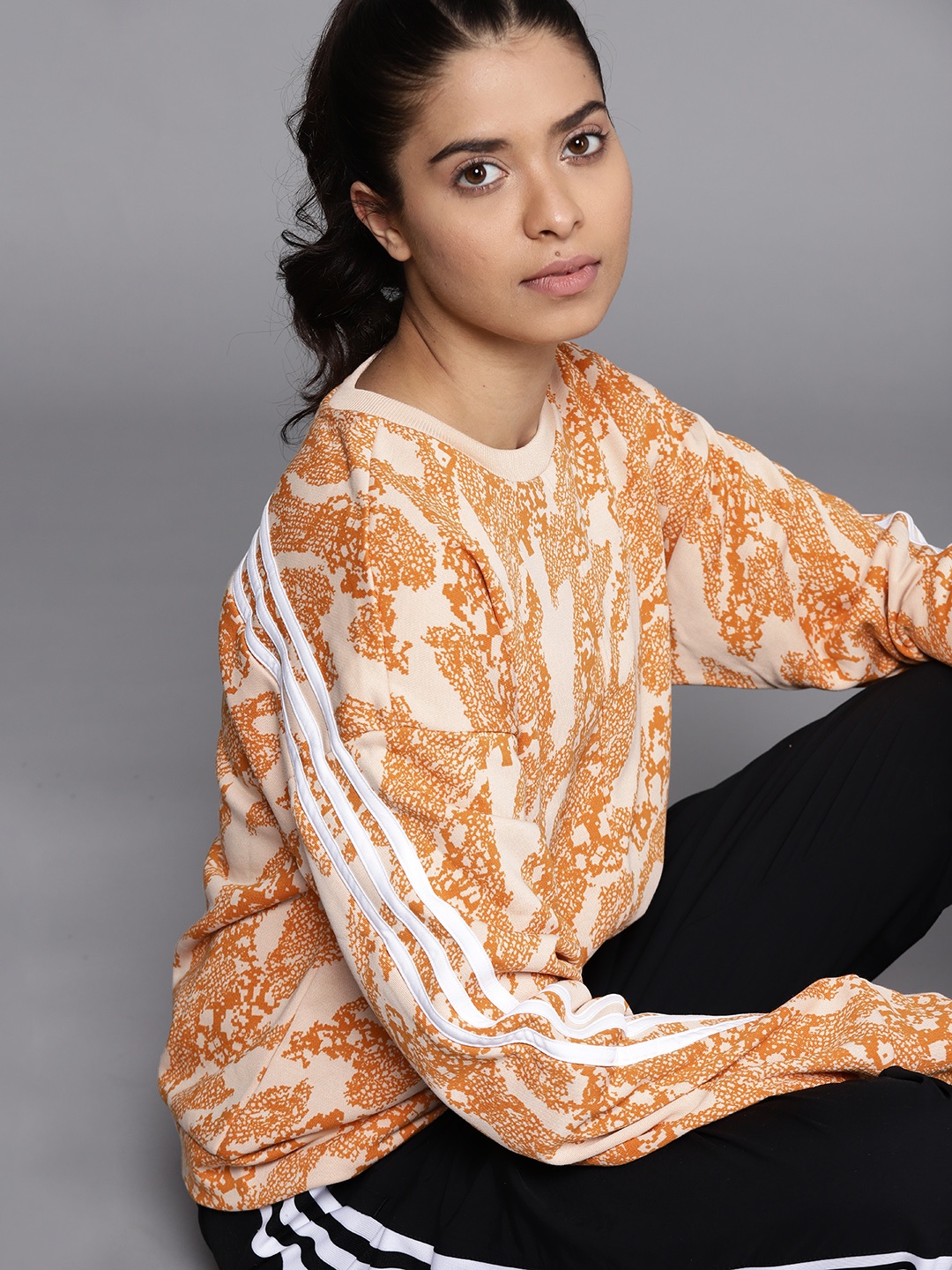 

ADIDAS Women Peach-Coloured & Orange Printed Future Icons Printed Sustainable Sweatshirt
