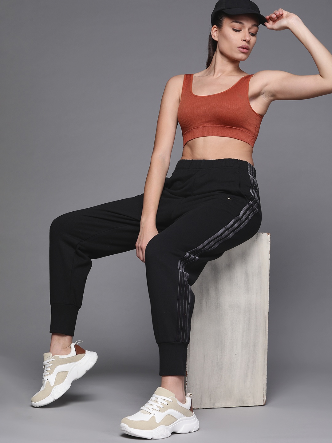 

ADIDAS Originals Women Black Solid Cuffed Track Pants with Velvet Striped & Trefoil Rivet