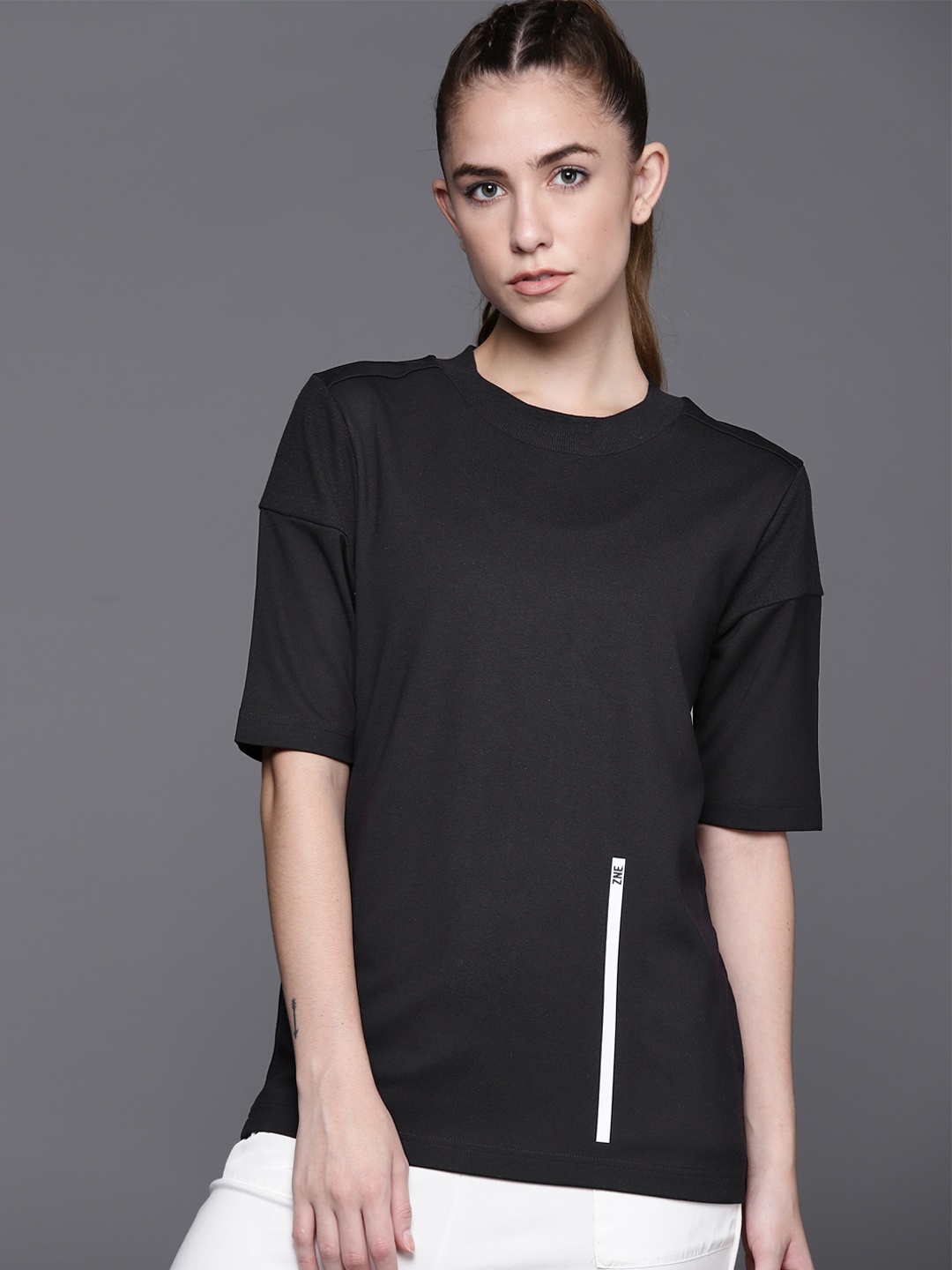 

ADIDAS Women Black Solid T-Shirt