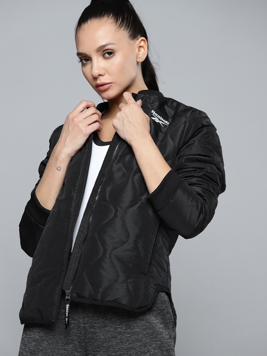 

Reebok Women Black OW U Solid Water-Repellent Quilted Outdoor Jacket