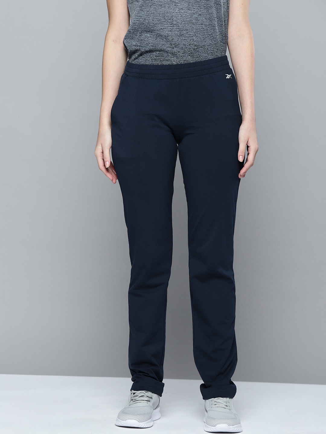 

Reebok Women Navy Blue Solid Training FND Track Pants