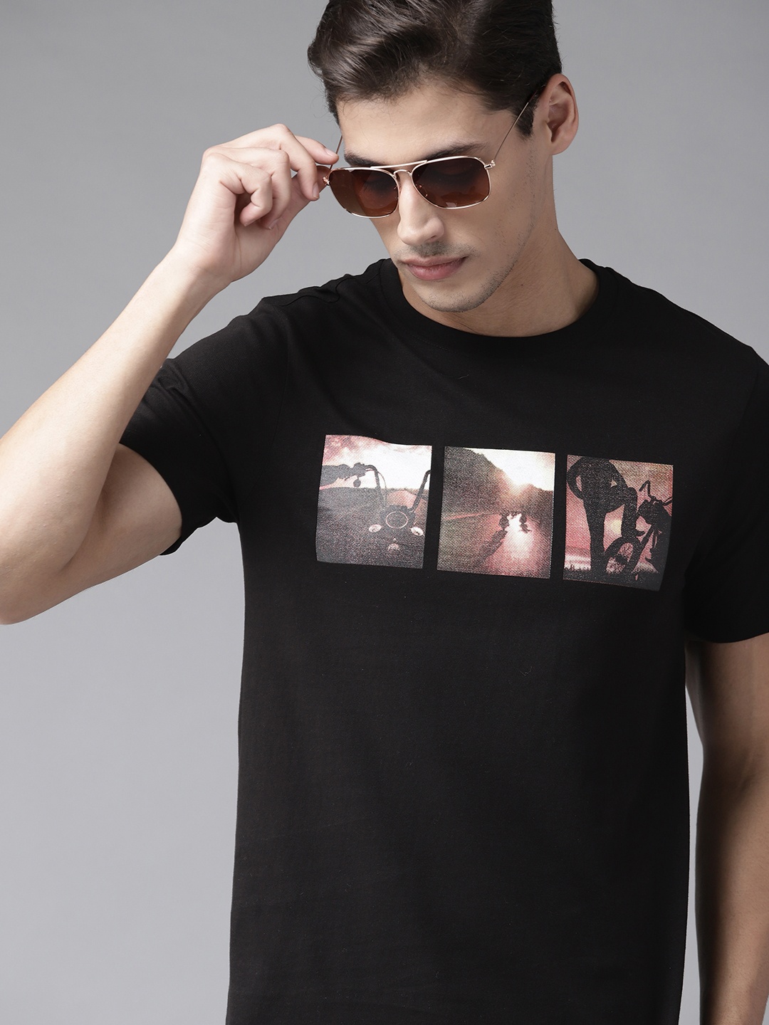 

Roadster Men Black & White Pure Cotton Printed T-shirt