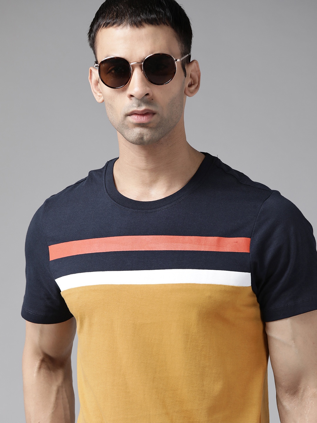 

Roadster Men Navy Blue & Mustard Yellow Pure Cotton Colourblocked T-shirt