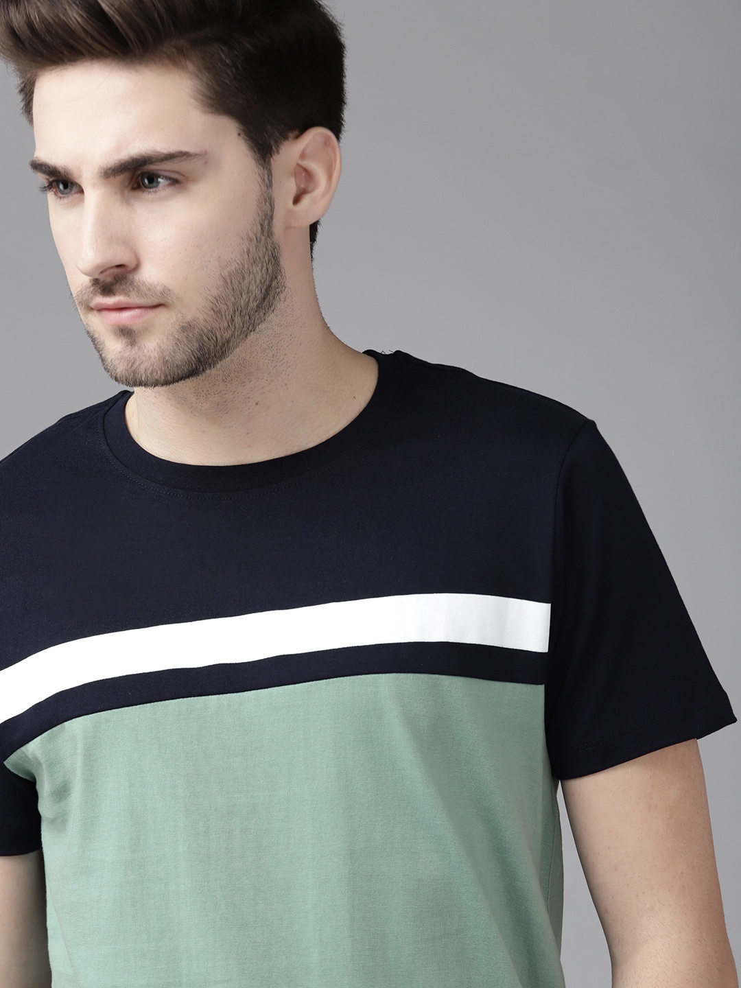 

Roadster Men Sea Green & Navy Blue Colourblocked Cotton T-shirt