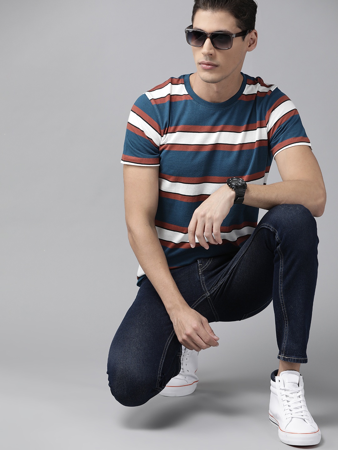 

Roadster Men Teal Blue & White Pure Cotton Striped T-shirt