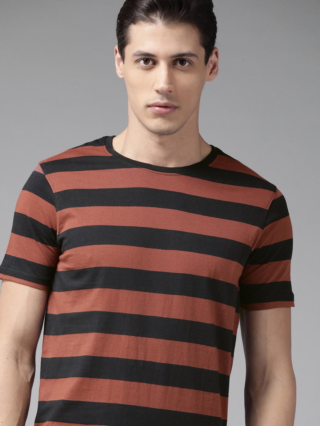 

Roadster Men Rust & Black Striped T-shirt