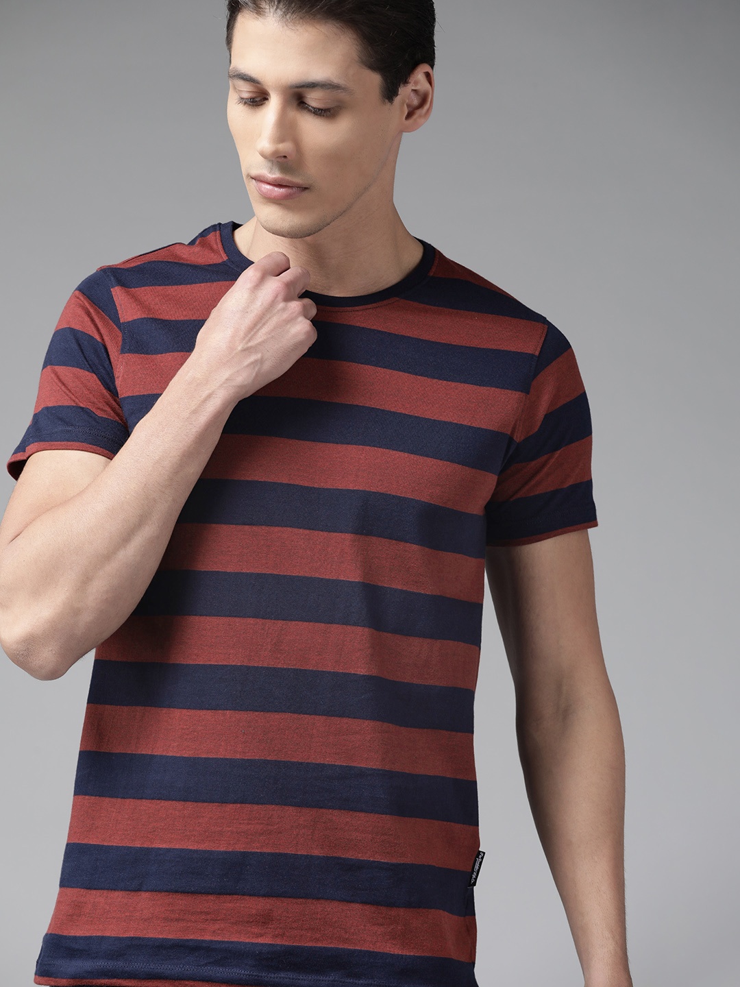 

Roadster Men Rust & Navy Blue Striped T-shirt