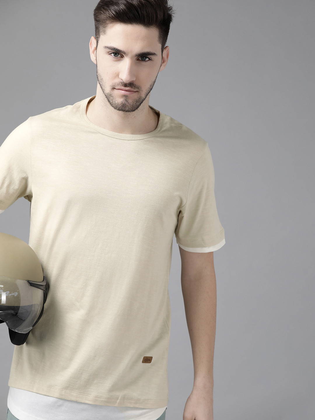 

Roadster Men Beige Solid Cotton T-shirt